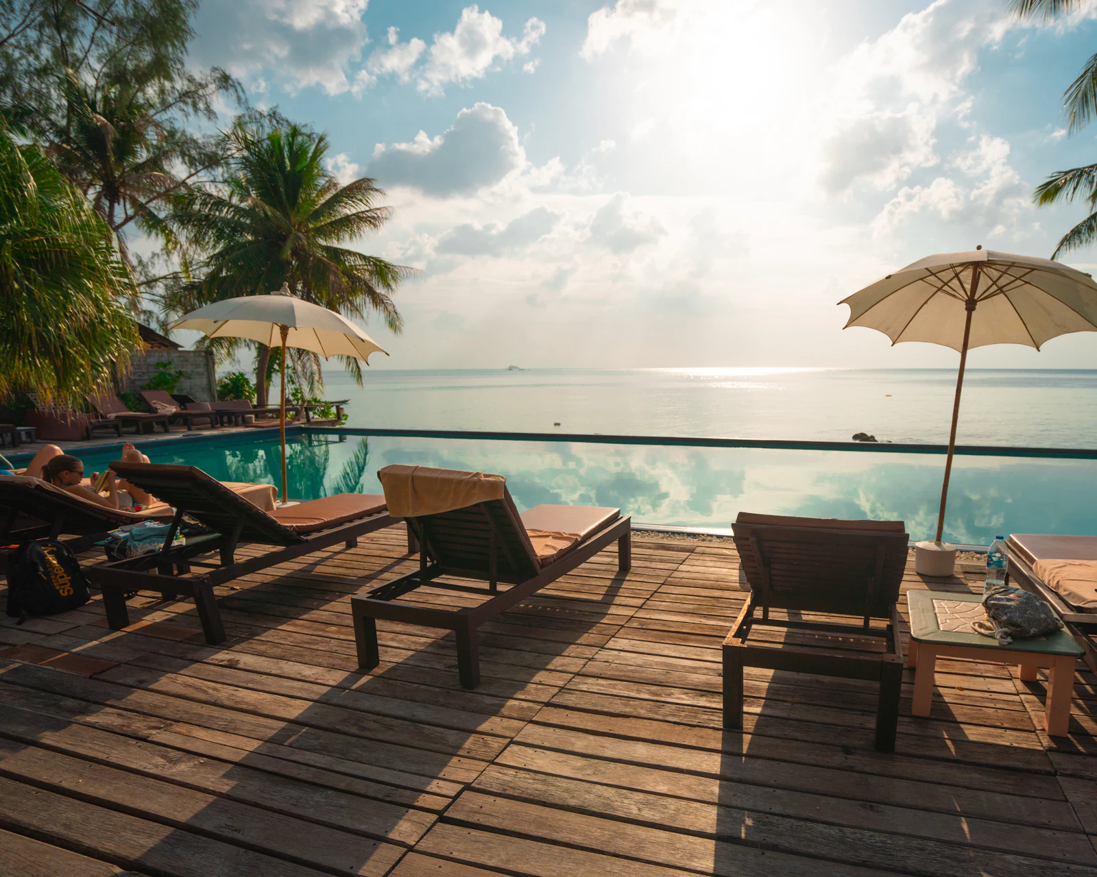 Infinity pool deck overlooking the sea, built by Pool Exotica